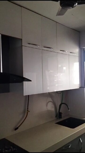 Kitchen in 2.5 BHK Apartment at Raheja Acropolis, Deonar – for Sale