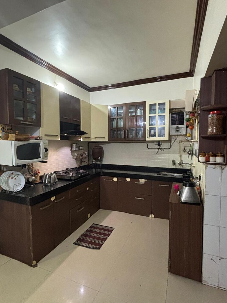 Kitchen, sree-mangal-aishwaryam-greens-phase-ii 2.5 Bedroom 1200 Sq.Ft. Apartment In Wakad Pune 9039485