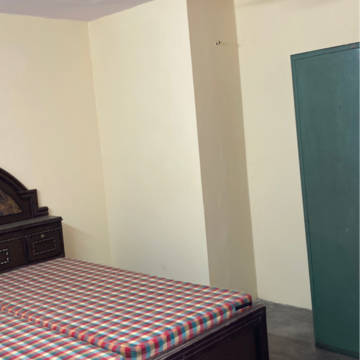 Bedroom in 2 BHK Builder Floor at Jaipuria Plaza, Sector 26 – for Rent