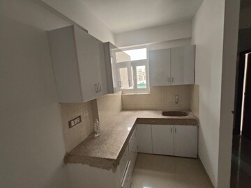 Kitchen in 2 BHK Apartment at ROF Amaltas, Sector 92 – for Sale
