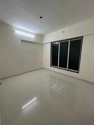 Room in 2.5 BHK Apartment at Wadhwa TW Gardens, Kandivali East – for Sale