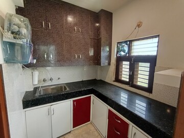 Kitchen in 2 BHK Apartment at Gaur City 2 - 10th Avenue, Sector 16c Greater Noida – for Rent