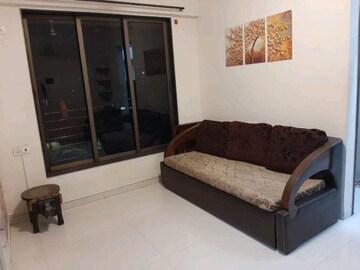 Living Room in 1 BHK Apartment at Bhoomi Acres, Waghbil – for Sale