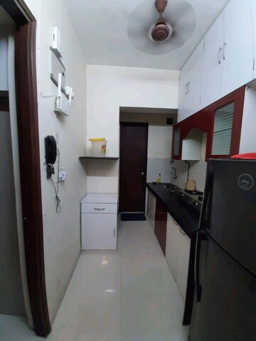 Kitchen in 1 BHK Apartment at Bhoomi Acres, Waghbil – for Sale