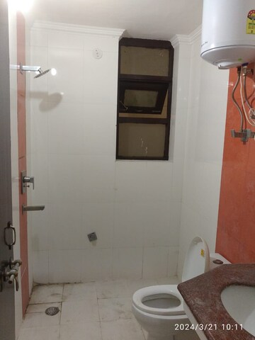 Bathroom in 3 BHK Apartment at Abhinandan CGHS, Sector 51 – for Rent