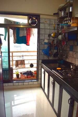 Kitchen in 2 BHK Apartment at Paradise Sai Riverdale, Taloja – for Sale