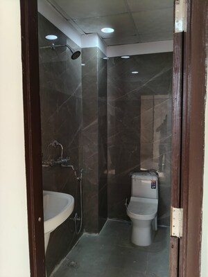 Bathroom in 3 BHK Apartment at Raja Park – for Sale