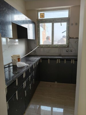 Kitchen in 3 BHK Apartment at Raja Park – for Sale