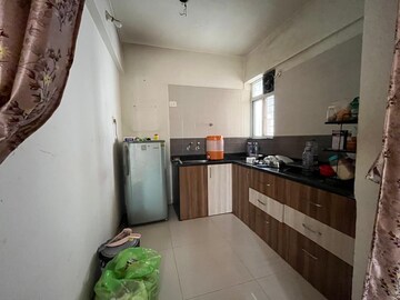 Kitchen in 2 BHK Apartment at Jhamtani Vision Ace Phase 1, Tathawade – for Rent