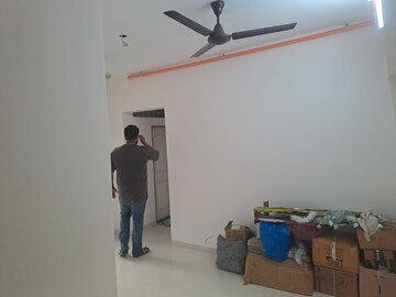 Living Room in 1 BHK Apartment at Sanghvi Ecocity Woods, Mahajanwadi – for Sale