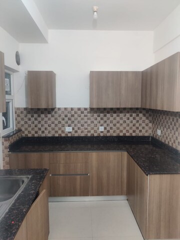 Kitchen in 3 BHK Apartment at Adani M2K Oyster Grande, Sector 102 – for Rent