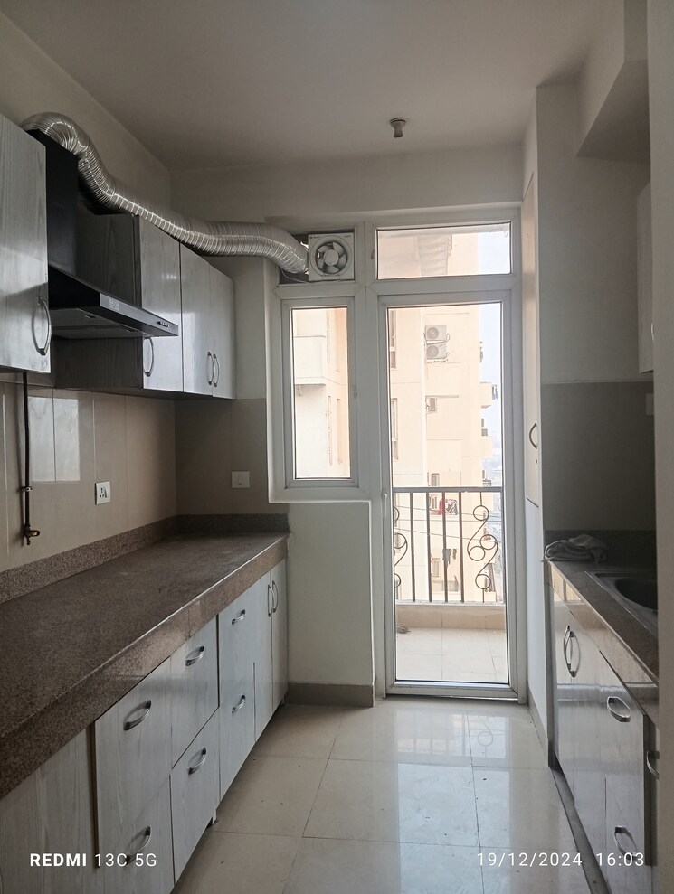 Kitchen, emaar-emrald-floors-select 2 Bedroom 1150 Sq.Ft. Apartment In Sector 65 Gurgaon 9040299