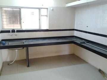 Kitchen in 3 BHK Apartment at G K Daffodils Housing Society, Pimple Saudagar – for Rent