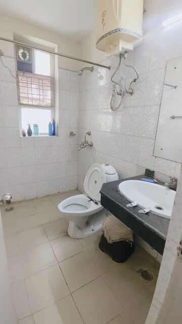 Bathroom in 3 BHK Apartment at JMD Gardens, Sector 33 – for Rent