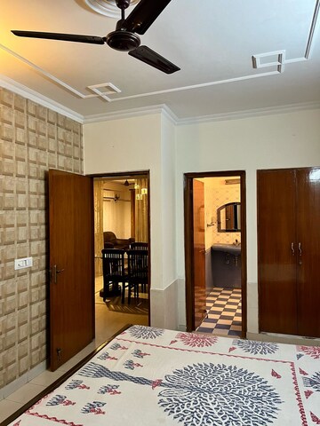 Bedroom in 3 BHK Builder Floor at Ansal Sushant Lok I, Sector 43 – for Rent