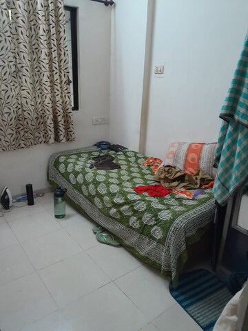 Bedroom in 2 BHK Apartment at Arihant Darshan CHS, Kandivali East – for Sale