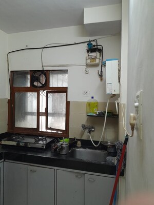 Kitchen in 2 BHK Apartment at Arihant Darshan CHS, Kandivali East – for Sale