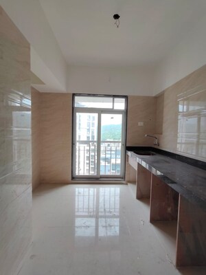 Kitchen in 1 BHK Apartment at Bhagwati Belmont, Haware City – for Sale