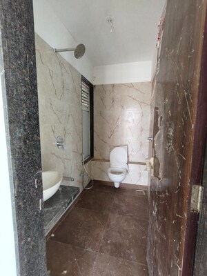 Bathroom in 1 BHK Apartment at Bhagwati Belmont, Haware City – for Sale