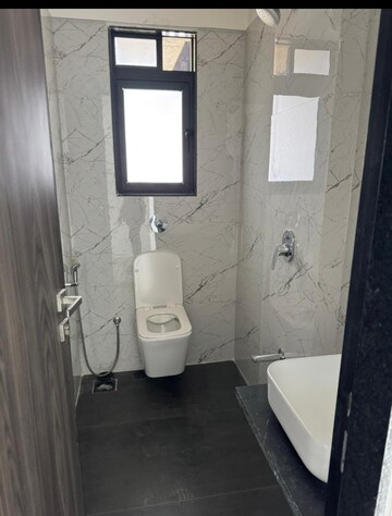 Bathroom in 2 BHK Apartment at Dev Leo Tower, Oshiwara – for Rent