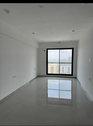 Room in 2 BHK Apartment at Dev Leo Tower, Oshiwara – for Rent