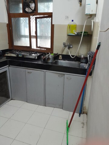 Kitchen in 2 BHK Apartment at Arihant Darshan CHS, Kandivali East – for Sale