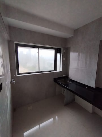 Kitchen in 1 BHK Apartment at Shivaji Park – for Sale