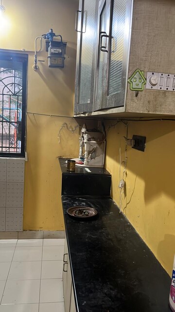 Kitchen in 1 BHK Apartment at Vijay Park, Kasarvadavali – for Sale