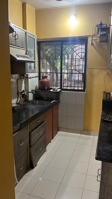 Kitchen in 1 BHK Apartment at Vijay Park, Kasarvadavali – for Sale