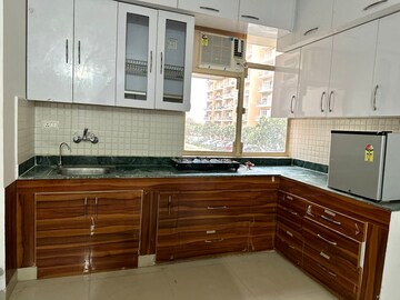 Kitchen in 2 BHK Apartment at Breez Global Heights, Sohna Sector 33 – for Rent