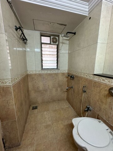 Bathroom in 3 BHK Apartment at Renaissance Tower, Andheri West – for Rent