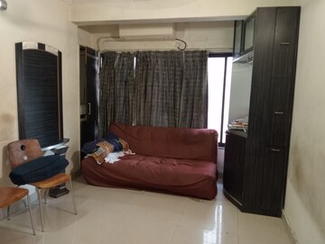 Living Room in 1 BHK Apartment at Bindra Marigold CHS, Andheri East – for Rent