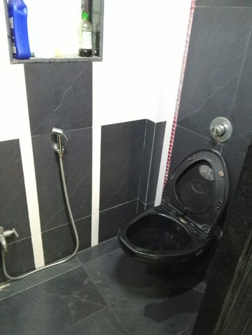 Bathroom in 1 BHK Apartment at Bindra Marigold CHS, Andheri East – for Rent
