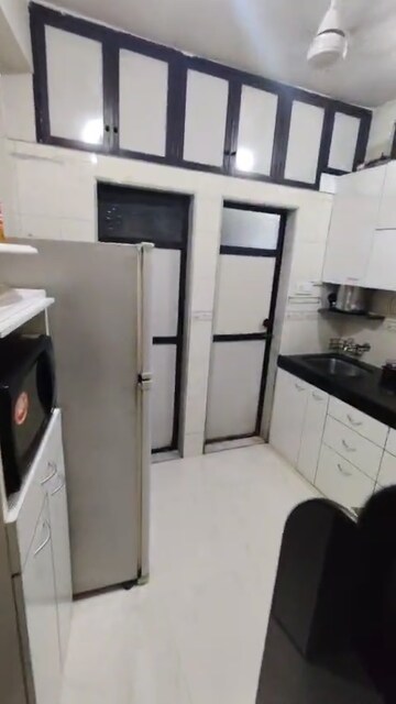 Kitchen in 1.5 BHK Apartment at Viman Darshan CHS, Andheri East – for Rent