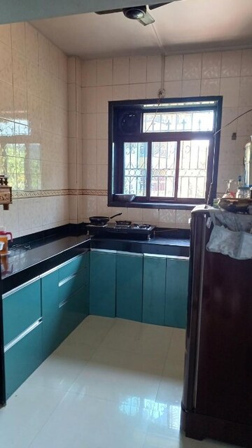 Kitchen in 1 BHK Apartment at Dombivli West – for Sale
