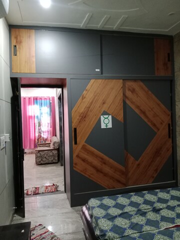 Bedroom in 1.5 BHK Builder Floor at Sector 18 – for Rent