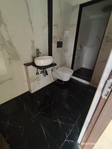 Bathroom in 2 BHK Apartment at Ruparel Ariana, Parel – for Rent