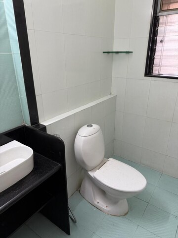 Bathroom in 3 BHK Apartment at Prarthna Heights, Parel – for Rent