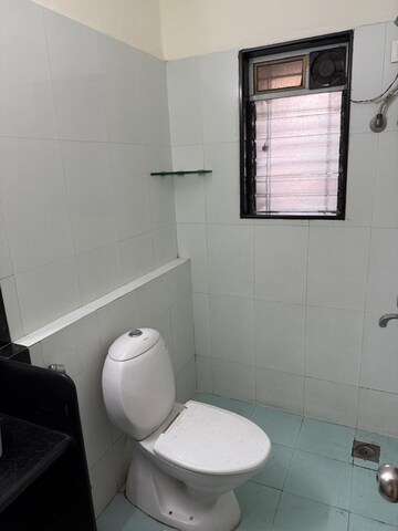 Bathroom in 3 BHK Apartment at Prarthna Heights, Parel – for Rent