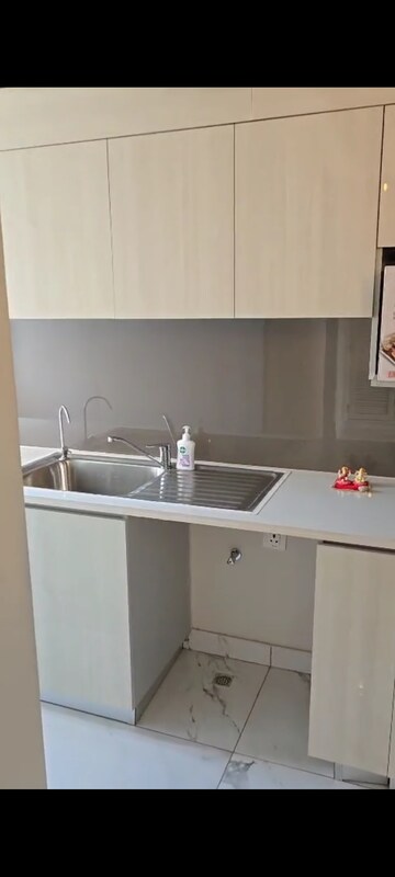 Kitchen in 2.5 BHK Builder Floor at Central Park Flower Valley Aqua Front Towers, Sohna Sector 33 – for Rent