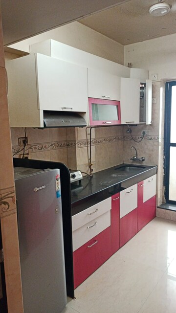 Kitchen in 2 BHK Apartment at K Raheja Heights, Malad East – for Rent