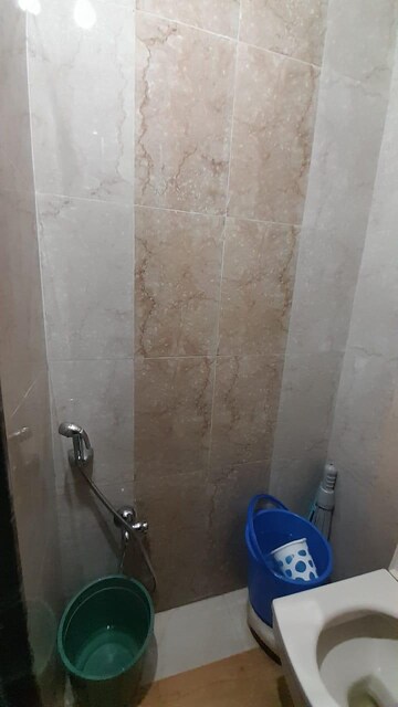 Bathroom in 1 BHK Apartment at Lumbini CHS, Khar West – for Sale