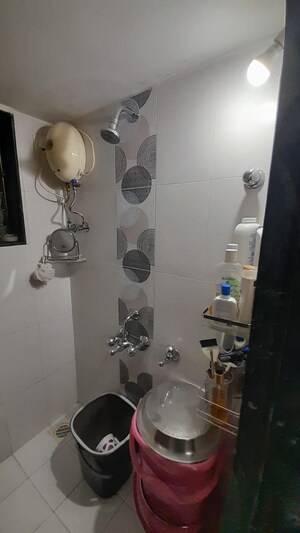 Bathroom in 1 BHK Apartment at Lumbini CHS, Khar West – for Sale