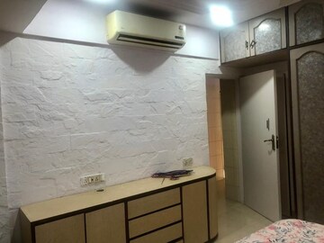 Room in 2 BHK Apartment at Aroma CHS, Andheri West – for Rent