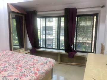 Bedroom in 2 BHK Apartment at Aroma CHS, Andheri West – for Rent