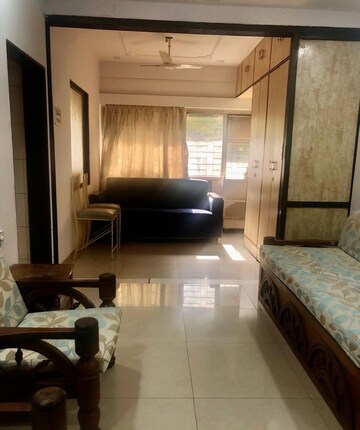 Living Room in 2 BHK Apartment at Aroma CHS, Andheri West – for Rent