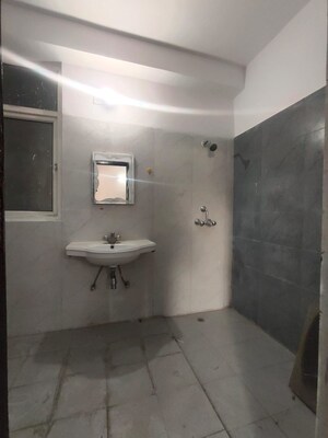 Bathroom in 4 BHK Apartment at Ramprastha Pearl Court, Vaishali Sector 7 – for Sale