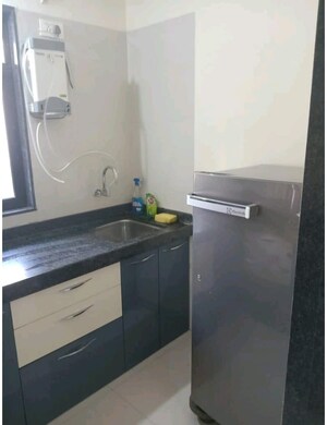 Kitchen in 1 BHK Apartment at Dosti Desire Joy, Brahmand – for Sale