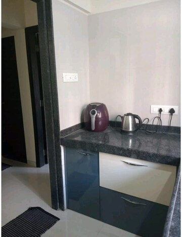 Bathroom in 1 BHK Apartment at Dosti Desire Joy, Brahmand – for Sale