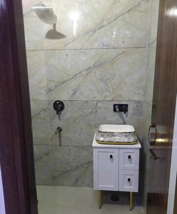 Bathroom in 3 BHK Apartment at Guru Nanak Enclave, Dhakoli – for Rent